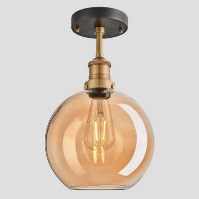 Industville Brooklyn Tinted Glass Globe Flush Mount, 9 Inch, Amber, Brass Holder