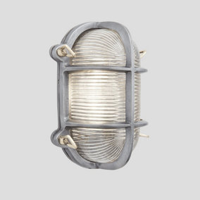 Industville Bulkhead Outdoor & Bathroom Oval Light, 6 Inch, Gunmetal, Side Wiring, Ribbed Glass