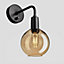 Industville Sleek Tinted Glass Globe Wall Light, 7 Inch, Amber, Black Holder