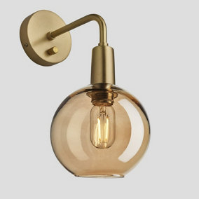 Industville Sleek Tinted Glass Globe Wall Light, 7 Inch, Amber, Brass Holder