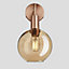 Industville Sleek Tinted Glass Globe Wall Light, 7 Inch, Amber, Copper Holder