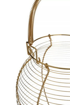 https://media.diy.com/is/image/KingfisherDigital/interiors-by-premier-hygge-gold-finish-egg-basket~5018705418308_04c_MP?$MOB_PREV$&$width=618&$height=618