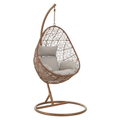 Interiors by Premier Luxurious Brown Rattan Hanging Chair, Versatile Lounge Chair, Sturdy Bedroom Chair, Modern Garden Chair