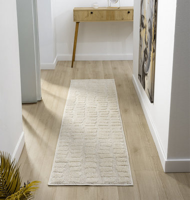 Isabella Living Room Area Rugs - Embossed Cobble Design Cream 60cm x 220cm