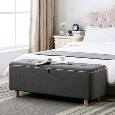 Bed footstool outlet with storage