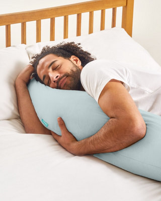 https://media.diy.com/is/image/KingfisherDigital/kally-body-pillow-stone-blue~5060340391928_03c_MP?$MOB_PREV$&$width=618&$height=618