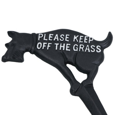 Cast Iron 'Please Keep Off The Grass' Sign On A Lawn. Dyfed, Wales