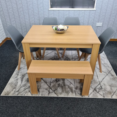Kitchen Dining Table, 4 Grey Chairs And 1 Bench Padded Cushioned Seats Chairs Oak Effect Wood Table Set 6 (140x80x75cm)