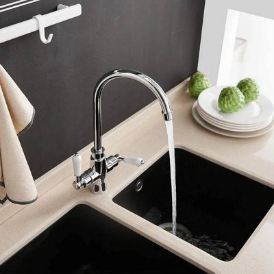 Kitchen tap with ceramic lever handles