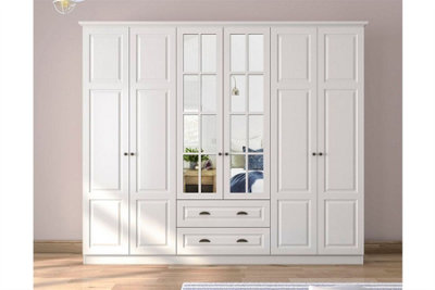 White armoire store with drawers