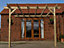 Lean to wooden garden pergola kit - Longhorn design wall mounted gazebo, 1.8m x 3.6m (Natural finish)