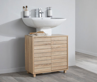https://media.diy.com/is/image/KingfisherDigital/light-oak-effect-bathroom-under-basin-sink-storage-cabinet~5016319503410_01c_MP?$MOB_PREV$&$width=618&$height=618