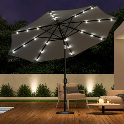Livingandhome 3M Outdoor Solar 24 LED Lights Garden Parasol Beach Umbrella  Crank Tilt with Round Base, Dark Grey | DIY at Bu0026Q