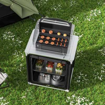 https://media.diy.com/is/image/KingfisherDigital/livingandhome-black-portable-outdoor-camping-bbq-picnic-kitchen-stand-unit-storage-76cm-w-x-56cm-d-x-114cm-h~0735940263467_02c_MP?$MOB_PREV$&$width=618&$height=618