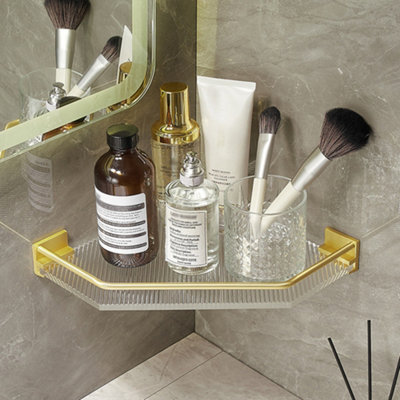https://media.diy.com/is/image/KingfisherDigital/livingandhome-gold-wall-mounted-acrylic-bathroom-corner-shelf-shower-storage-organiser~0735940247337_01c_MP?$MOB_PREV$&$width=768&$height=768