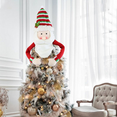 https://media.diy.com/is/image/KingfisherDigital/livingandhome-santa-claus-hugger-christmas-tree-top-hat-xmas-topper-tree-cover-home-decor~0735940256360_01c_MP?$MOB_PREV$&$width=618&$height=618