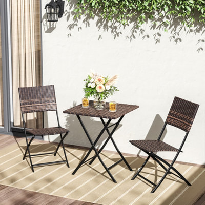 Folding rattan deals chairs and table