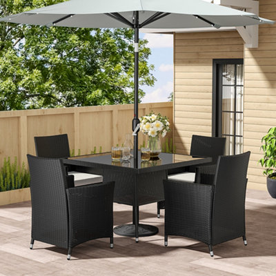 Small deck table with outlet umbrella