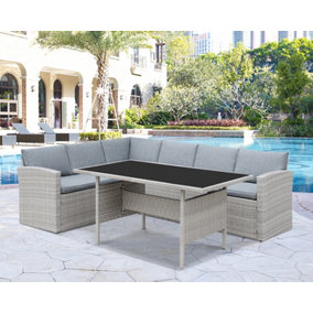 Louisa Corner Grey Rattan Sofa Garden Set for Outdoors L Shaped Black Glass Topped Dining Table Grey Cushions