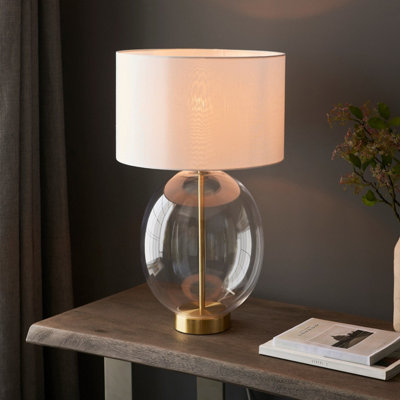 Luminosa Kelda Oval Table Lamp with Round Shade Satin Brass Plate, Clear Glass With Vintage White Fabric, 1x E27