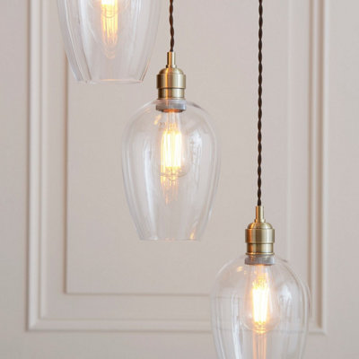 Luminosa Livorno Cluster Pendant Ceiling Light Antique Brass Plate & Clear Glass 7 x 10W LED E27