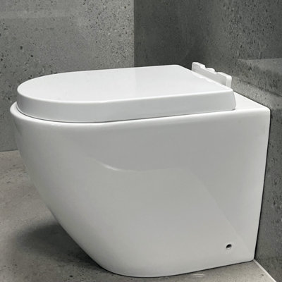 Luna Ceramic Round Back to Wall Toilet Pan with Soft Closing Seat