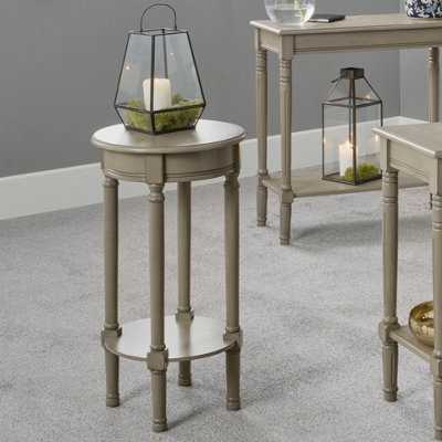 Tall pedestal store accent table