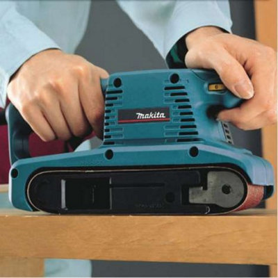 Makita 9911 3 3 Inch 75 x 457mm Heavy Duty Corded 240v Belt Sander Dust Bag DIY at B Q