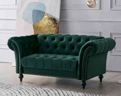 Green tufted store sofa