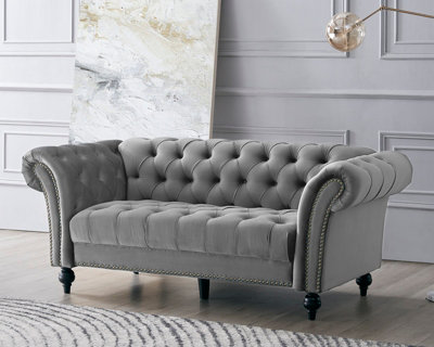 Grey velvet on sale studded sofa