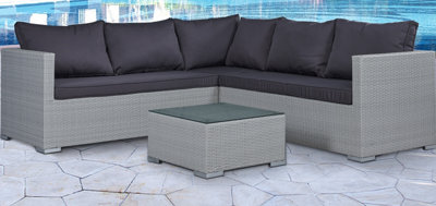 Medina 4 Piece Modular Grey Rattan Sofa Garden L- Shaped Lounge Set with Glass Topped Coffee Table  Dark Grey Cushions