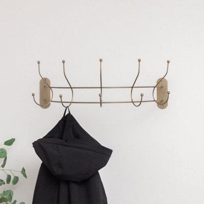 Melody Maison Antique Gold Curved Coat Hanger Rail with 5 Storage Hooks ...