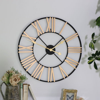 Melody Maison Black and Gold Large Skeleton Wall Clock