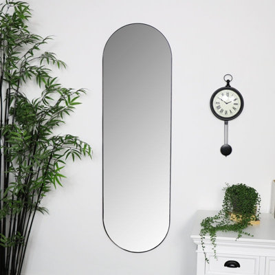 Melody Maison Black Oval Wall Mirror 40cm x 140cm