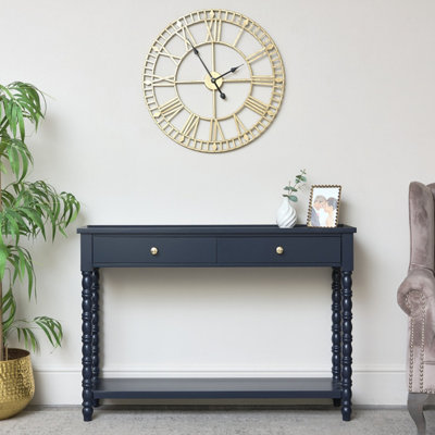 Navy blue and store gold console table