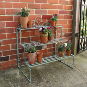 Melody Maison Sage Green Metal Three Tier Plant Stand
