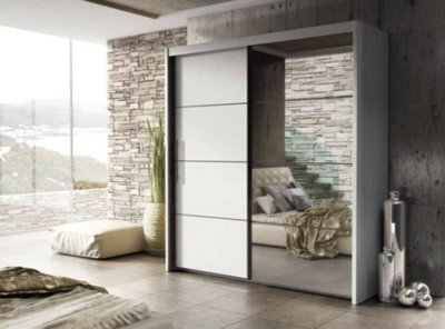 Modern White Inova Sliding Door Wardrobe W2000mm H2160mm D620mm - Mirror Finish, Eight Shelves, Versatile Storage