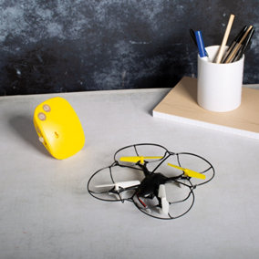 Motion Control Flying Quadcoptor in Yellow 