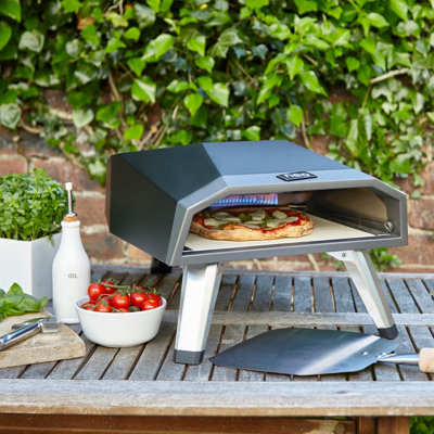 Neo 12 Gas Pizza Oven Comes With 2m Regulator Cover Stone Peel u0026 Cutter |  DIY at Bu0026Q