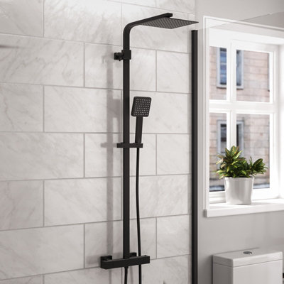 https://media.diy.com/is/image/KingfisherDigital/nes-home-modern-square-matte-black-exposed-thermostatic-mixer-shower-set-with-shower-head-and-handheld~3757421560664_01c_MP?$MOB_PREV$&$width=618&$height=618