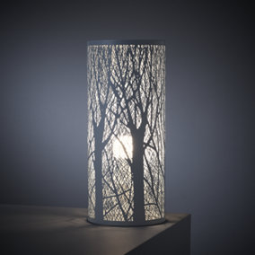 nielsen Arford 1 Light Table Lamp. Finished in Matt White featuring a Forest effect pattern