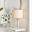 NORA Contemporary Clear Glass Table Lamp With Gold Chrome Details and Cream Shade Including A Rated Energy Efficient LED Bulb