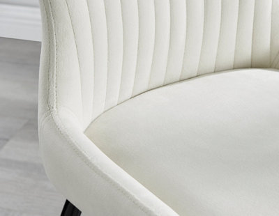 Cream chairs with store black legs