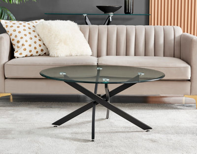 Novara Round Glass Coffee Table with Angled Starburst Black Metal Legs for Modern Industrial Minimalist Living Room