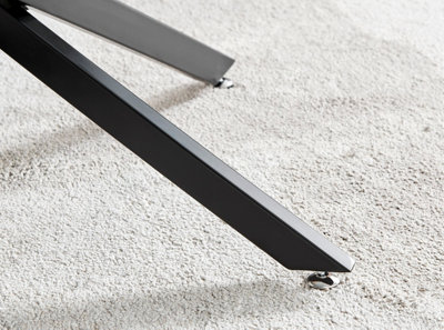 Novara Round Glass Coffee Table with Angled Starburst Black Metal Legs for Modern Industrial Minimalist Living Room