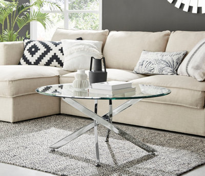 Novara Round Glass Coffee Table with Angled Starburst Silver Chrome Metal Legs for Modern Glam Minimalist Living Room