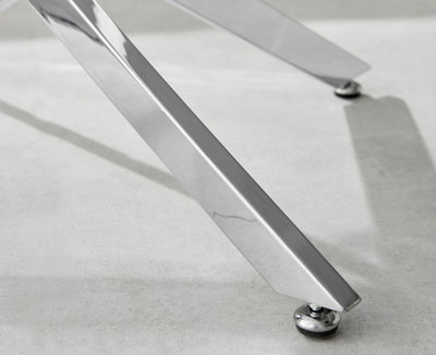 Novara Round Glass Coffee Table with Angled Starburst Silver Chrome Metal Legs for Modern Glam Minimalist Living Room