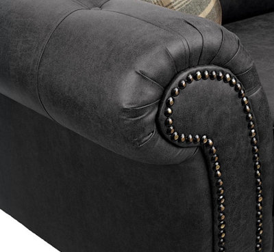 Black sofa with nailhead trim discount