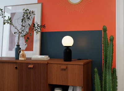 Orange and blue mid century modern living room.