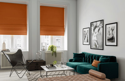 Orange blinds in a white room.